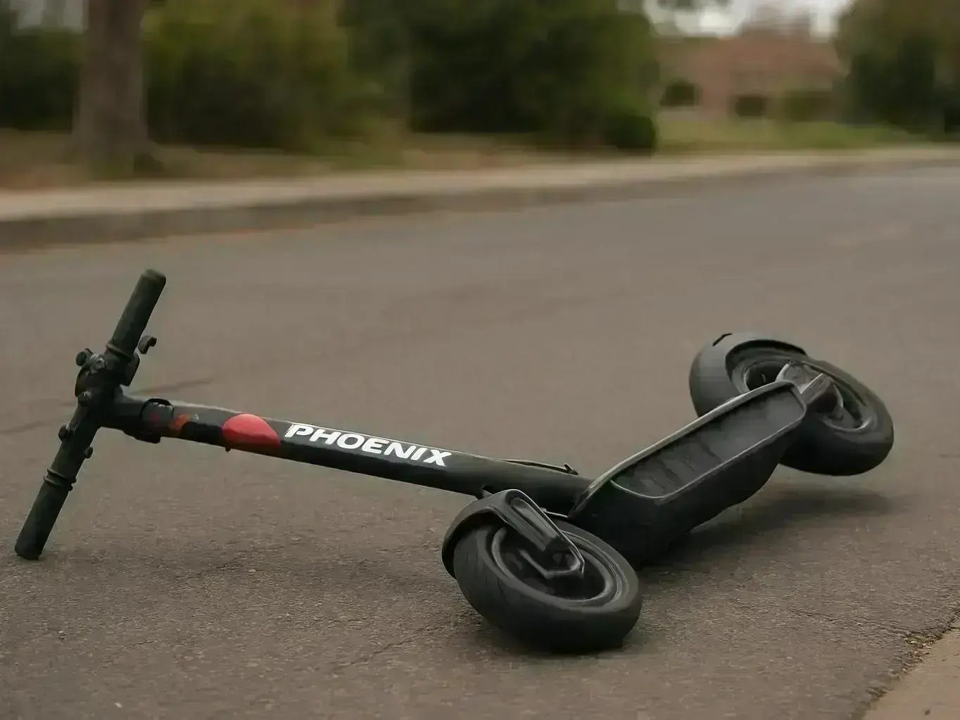 Ahwatukee e-scooter accident lawyer reviewing crash evidence near Chandler Boulevard and Ahwatukee Foothills Towne Center